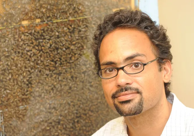 Brian Johnson in front of his bee observation hive. (Photo by Kathy Keatley Garvey)