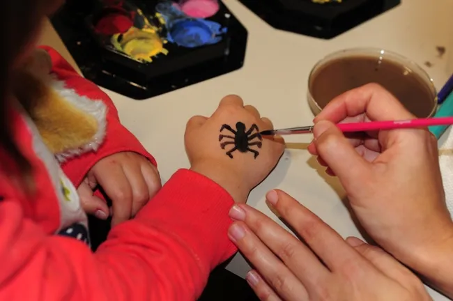 The beginning of a black widow spider tattoo, compliments of entomology Jessica Gillung of the Bohart. (Photo by Kathy Keatley Garvey)