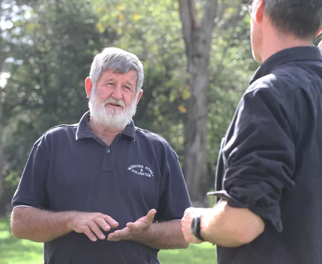 Apiarist/pollination specialist Trevor Monson (left) talks bees with pollination ecologist Neal Williams, associate professor, UC Davis Department of Entomology and Nematology. (Photo by Kathy Keatley Garvey)