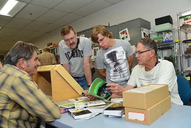 Dragonfly expert Rosser Garrison (far right) leads a discussion. From left are Bohart associate Greg Kareofelas; Bob Stahmer of Stockton, a UC Davis alumnus; and UC Davis entomology graduate student Ziad Khouri, who studies with Bohart director/UC Davis professor Lynn Kimsey. (Photo by Kathy Keatley Garvey)