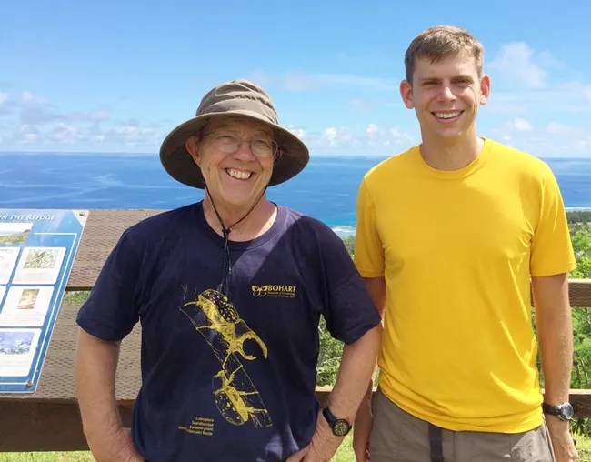 Researchers Hugh Dingle (left) UC Davis emeritus professor of entomology, and Mikah Freedman, UC Davis graduate student, in Guam in 2015.