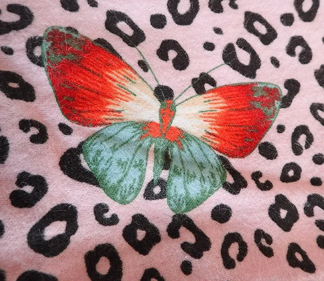 This butterfly-themed blanket is the work of Erica Lull for the "Cuddle Me Close" 4-H community service project. (Photo by Kathy Keatley Garvey)