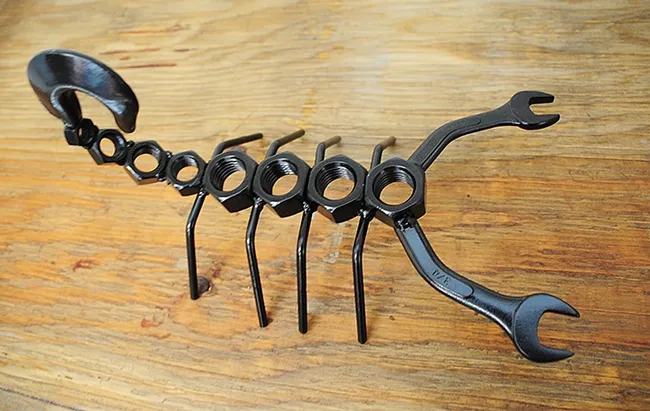 This scorpion sculpture, made of hex nuts, is the work of Roberto Ortiz of the Dixon FFA and is displayed in the Dixon May Fair's Youth Building. (Photo by Kathy Keatley Garvey)