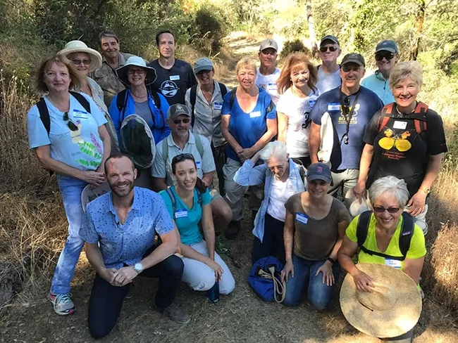This is the group, including UC Master Gardeners, who toured the dogface butterfly habitat. Rob Stewart of "Rob on the Road" is kneeling, front left. Many wore butterfly shirts. Justin Wages, Placer Land Trust manager, is back row, fourth from left.