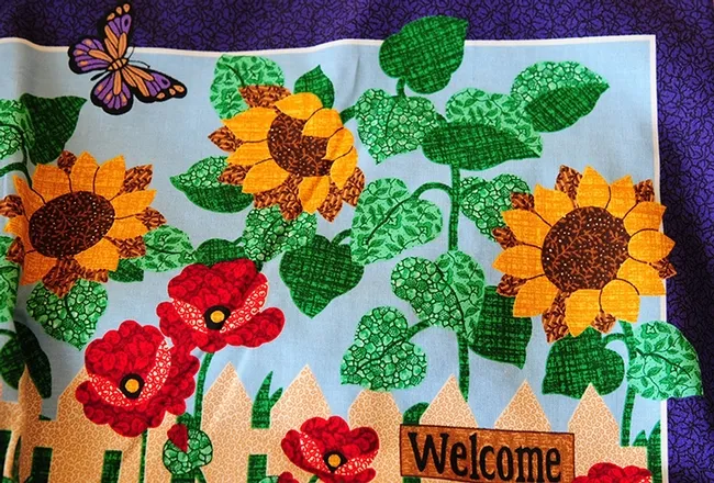 Turn Linda Douthit's vest over, and you see this: more butterflies and blossoms. She a regular exhibitor in the Solano County Fair. (Photo by Kathy Keatley Garvey)