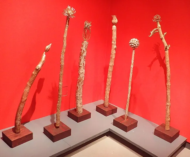 This art by professor emerita Ann Savageau of the Department of Design shows beetle galleries as "Totem Art." (Photo by Kathy Keatley Garvey)