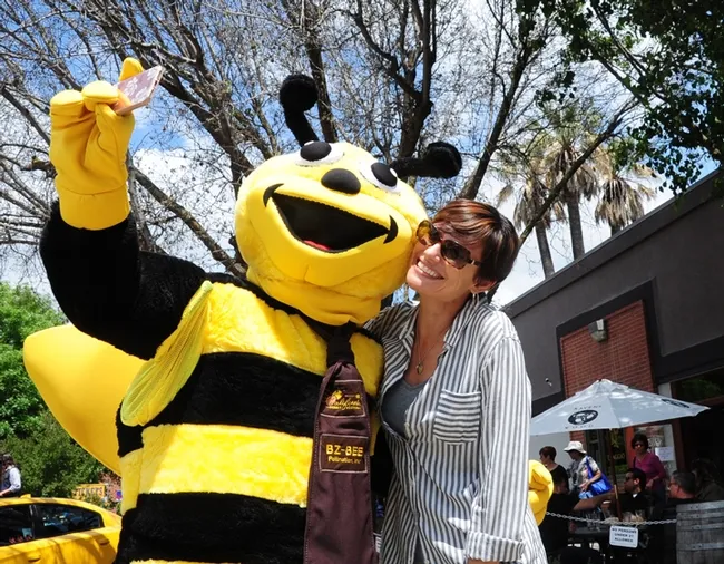 Miss Honey Bee, Benji Shade of Woodland Christian High School, takes a selfie with her teacher, Jessica Hiatt at the inaugural California Honey Festival in downtown Woodland. This year's festival is Saturday, May 5.