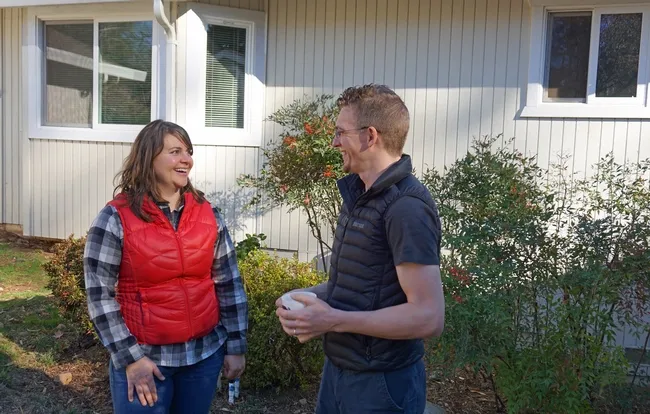 Kate Wilkin and her husband Josiah Johnston in front of their Grass Valley home.