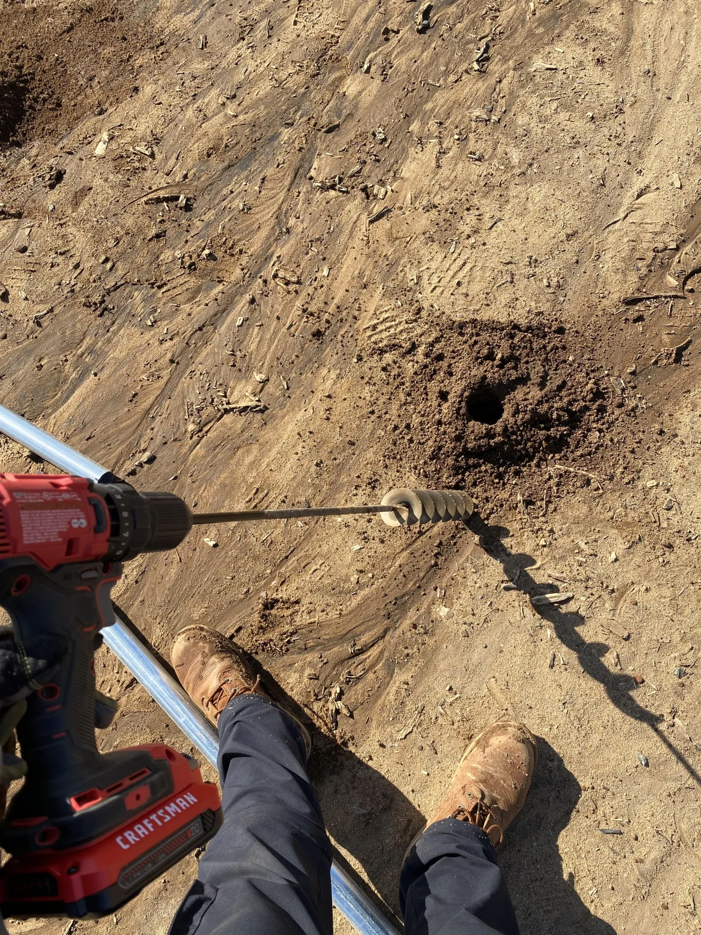 Figure 1. A 2 in x 32 in auger drill bit was used to drill holes into the ground for the ground posts.