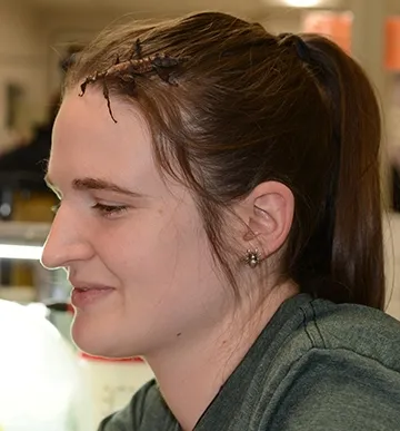 UC Davis graduate student Charlotte Herbert wore a walking stick