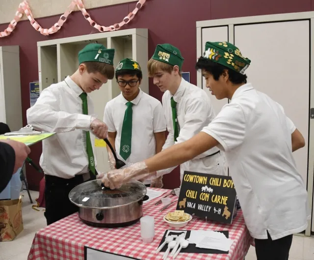 The Cowtown Chili Boys of the Vaca Valley 4-H Club--from left, Xander Lovell, Matthew Agbayani, Ian Weber and Francis Agbayani--test the temperature of their chili at the Solano County 4-H Chili Cook-Off. They went on the win the competition. (Photo by Kathy Keatley Garvey)