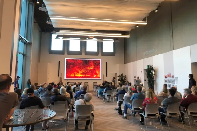 Community members attending a wildfire meeting
