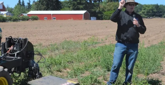Marcelo Moretti demonstrates electric weed control at a past Oregon Blueberry Field Day at OSU's North Willamette Research and Extension Center in Aurora, Ore. Moretti is working on the technology for use in both blueberries and hazelnuts. (Photo credit: Mitch Lies)