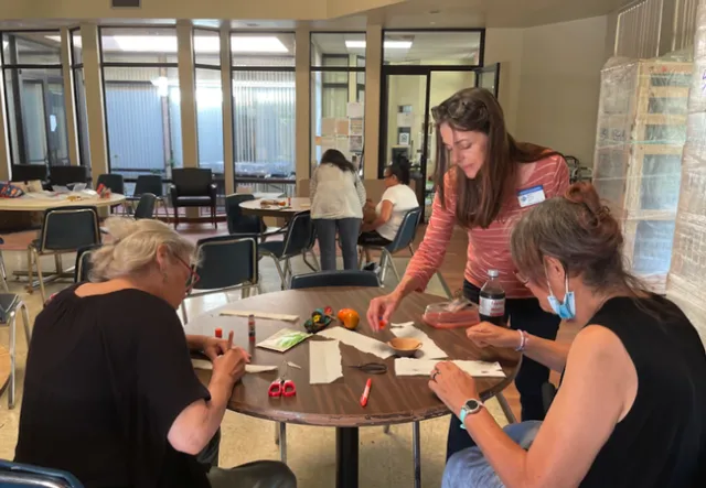 UC Master Gardeners teach residents how to make seed tape. Photo courtesy of Shital Parikh.