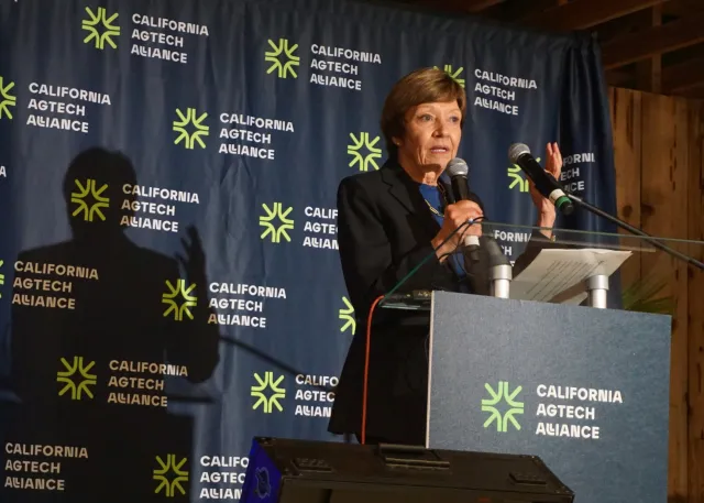 CDFA Secretary Karen Ross speaks at a podium