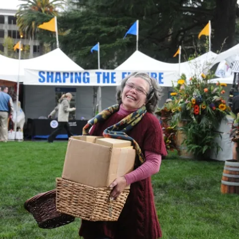Kathy Kellison, executive director of Partners for Sustainable Pollination, headquartered in Santa Rosa, delivers information to the 2011 beekeepers' booth. (Photo by Kathy Keatley Garvey)