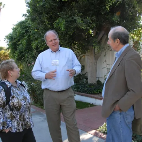 Kelli Hoover of Penn State chats with Kevin Heinz (center) of Texas A&M and Bruce Hammock of UC Davis at a meeting of the Entomological Society of America. (Photo by Kathy Keatley Garvey)