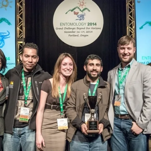 The UC Davis team included (from left) Margaret “Rei” Scampavia, Ralph Washington Jr., Jenny Carlson, captain Mohammad-Amir Aghaee and Danny Klittich. At far right is ESA president Frank Zalom of UC Davis who presented the team with its award. (Photo by Trav Williams of Broken Banjo Photography