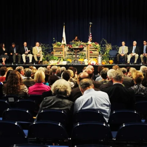 Helene Dillard, dean of the UC Davis College of Agricultural and Environmental Sciences, welcomes the crowd at the Oct. 2nd college celebration honoring recipients of the Award of Distinction. (Photo by Kathy Keatley Garvey)