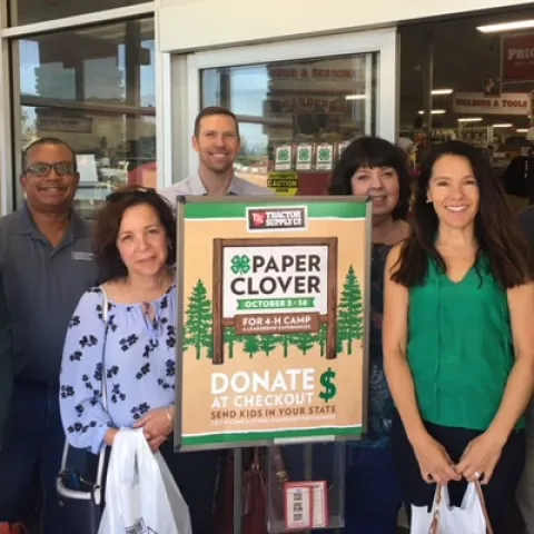 From left, Lorna Krkich, Greg Gibbs, Maria Fernandez, Kelly Scott, Emily Delk, Mary Ciricillo and Scott Brayton stopped by Tractor Supply in Dixon to buy 4-H Paper Clovers.