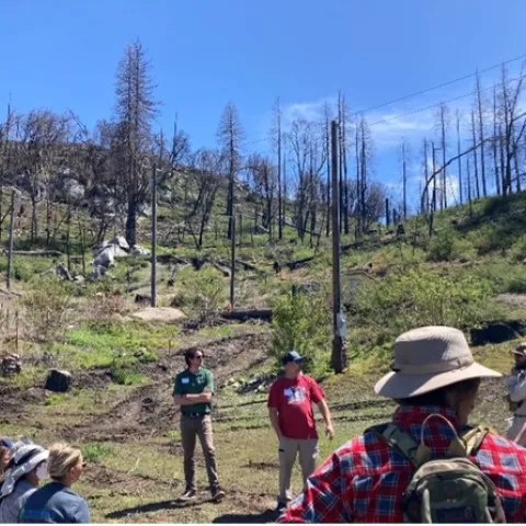 A landowner discusses the challenges of rebuilding post-Creek Fire. Photo credit: Katie Reidy.