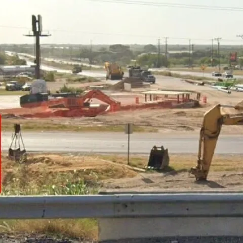Red and yellow rectangles mark johnsongrass in an image of a construction site