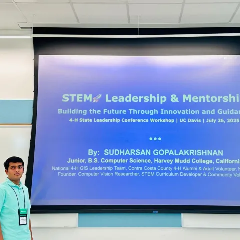 Sudy with the title slide of his SLC presentation