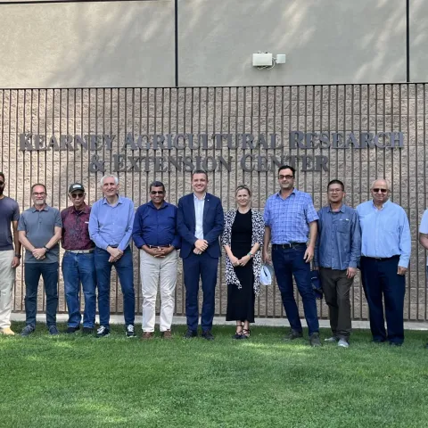 Catalan and ANR scientists pose under the Kearney sign