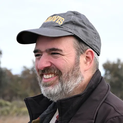 UC Davis medical entomologist Geoffrey Attardo engaged in research at Cache Creek. (Photo by Kathy Keatley Garvey)