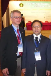 Chemical ecologists Walter Leal (left) and Yuko Ishida at a 2011 conference in China.