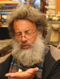 Butterfly expert Art Shapiro, distinguished professor of evolution and ecology at UC Davis, holds the 2012 winner. (Photo by Kathy Keatley Garvey)
