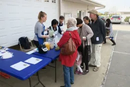 EFNEP staff makes fresh fruit smoothies and discuss safe food handling.