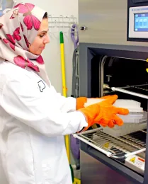 Researcher in a UC plant lab