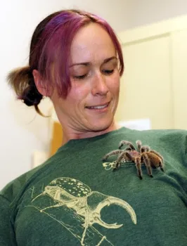 UC Davis entomology major Christine Melvin with Peaches, a four-year-old tarantula. Melvin is a fourth-year undergraduate student. (Photo by Kathy Keatley Garvey)
