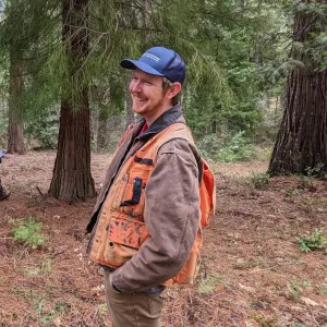Austin Roughton teaches forestry in the field