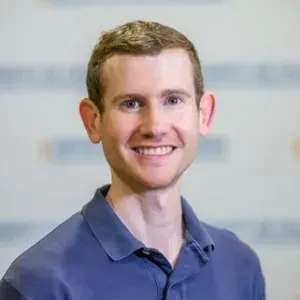 Man in front of wall for portrait