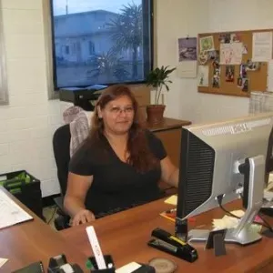 Person sitting in office setting