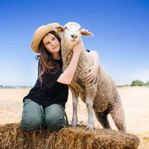 Youth holding lamb